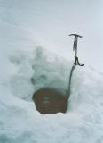 Exploring a natural hole in the snow 