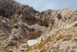 Large sinkhole below the summit of Mavri
