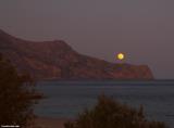 Full moon rising over the peninsula to the East of Paleochora