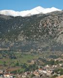 A small section of the plateau of Askyfou with the snowy summits of Kastro and Fanari towering above. The photo was taken along the road that comes from Vrysees as it descends towards the plateau