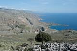 Standing on top of a ridge that runs along the coastline between the gorges of Eligas and Aradena at around 600m. I am looking towards the East and can see the gorge of Aradena, the bay of Finix, the Loutro peninsula and in the distance Hora Sfakion and further away Frangokastello